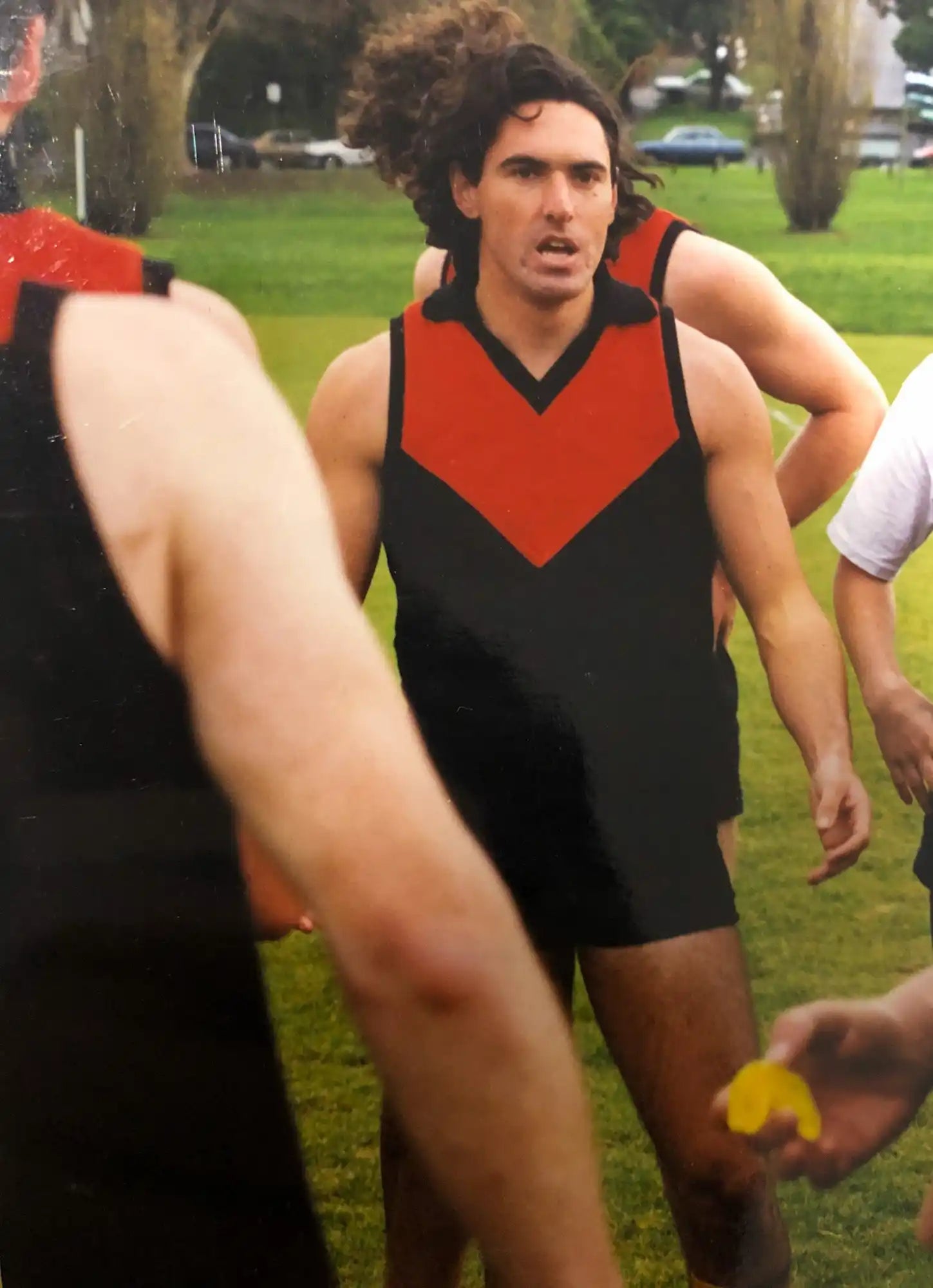 Australian rules football player in uniform.