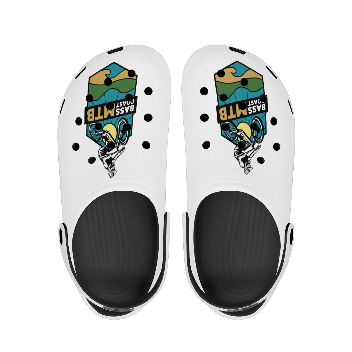 Pair of white and black clogs with a graphic design.