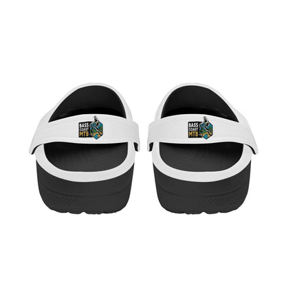 Pair of white and black slip-on sandals.