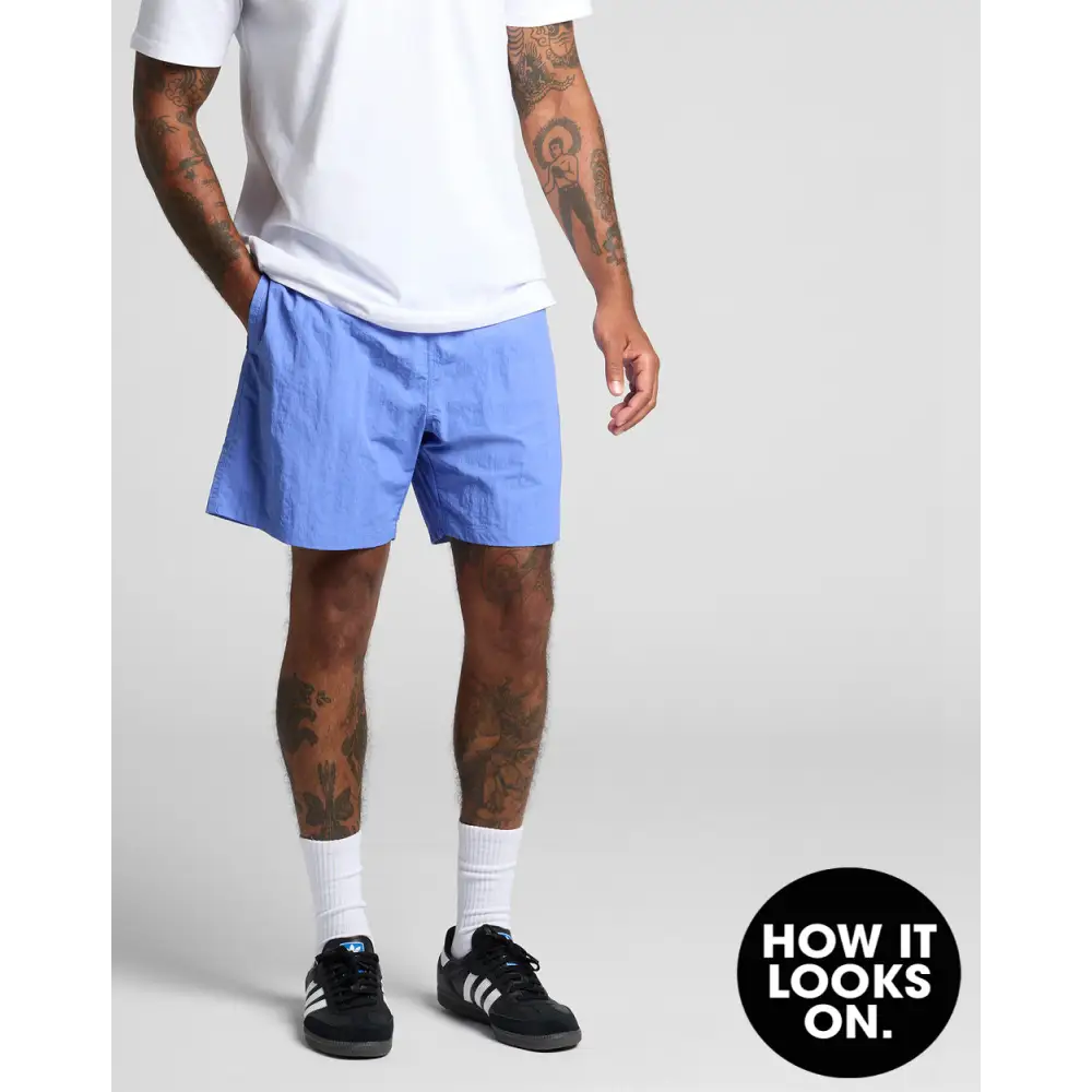 Man wearing blue shorts.