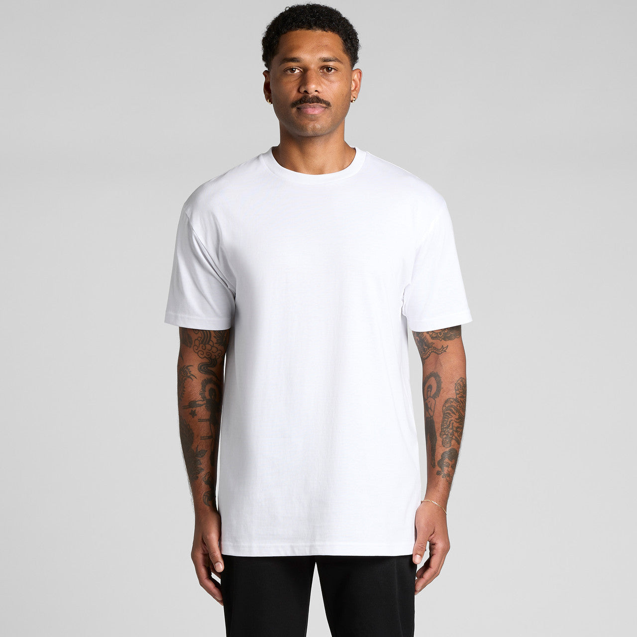 White crew neck t-shirt with short sleeves and a relaxed fit.