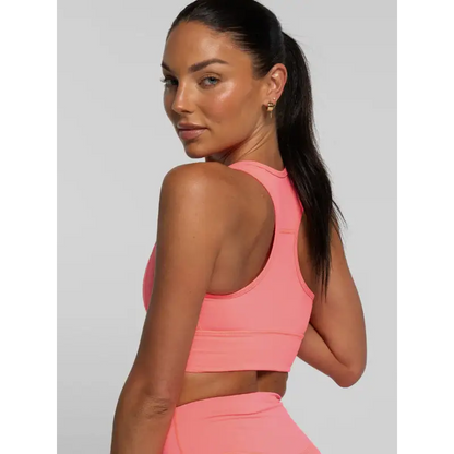 Coral-colored sports bra.