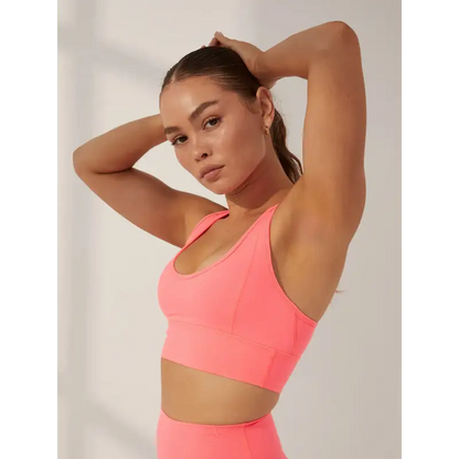 Coral-colored sports bra.