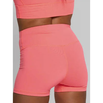 Coral-colored athletic shorts.