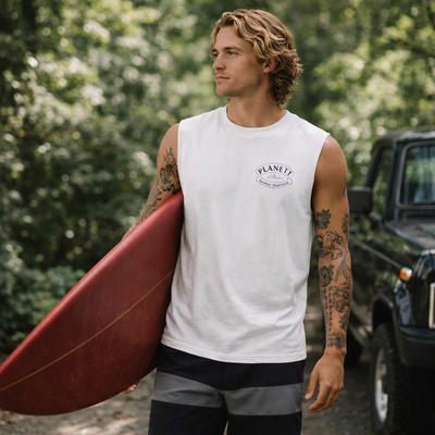 White sleeveless tank top with a small embroidered logo on the chest
