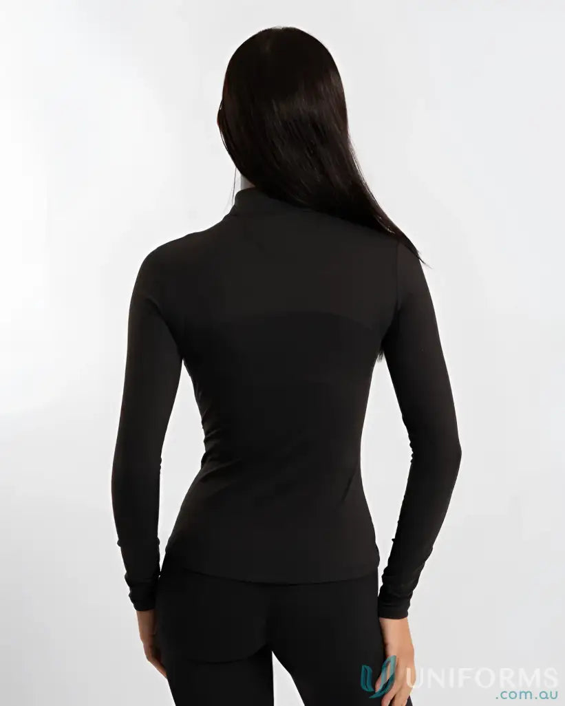 Black turtleneck sweater with long sleeves and ribbed cuffs.