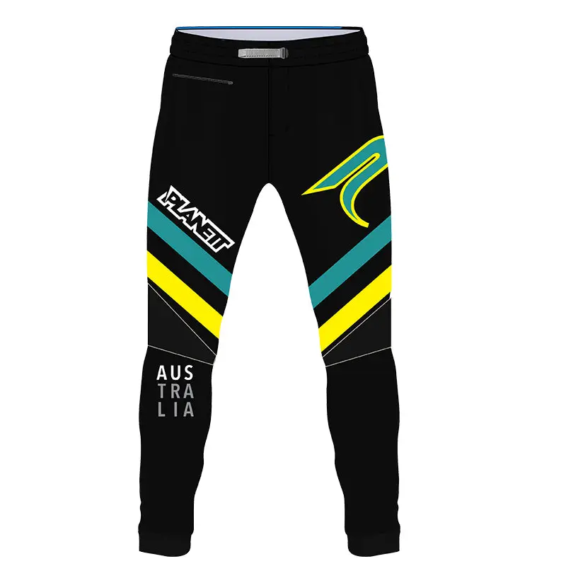 Black motocross pants with yellow and teal accents.