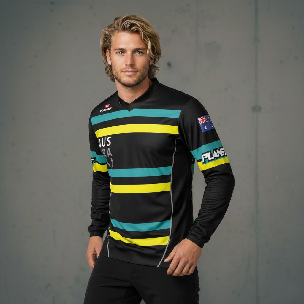 A long-sleeved black sports jersey with yellow and teal horizontal stripes across the chest and back, and an Australian flag patch on the right sleeve.
