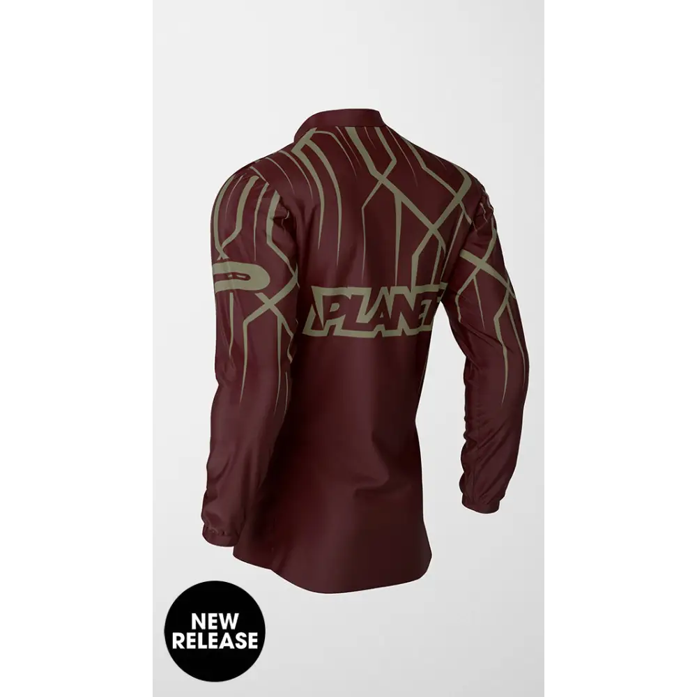 Maroon long-sleeved shirt with abstract design.