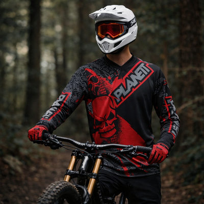 White helmet with orange-tinted goggles and black strap, featuring a sleek aerodynamic design.