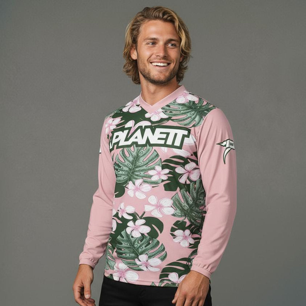 Men’s long-sleeved pink and green floral print jersey with a V-neck.