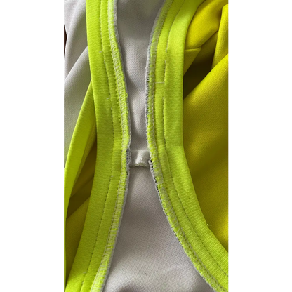 Neon yellow and white garment straps.