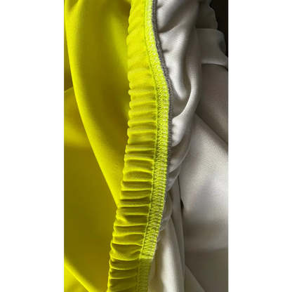 Yellow and white elastic fabric.