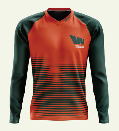 Long-sleeved orange and green shirt.