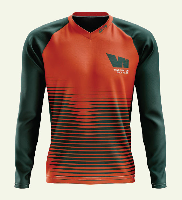 Long-sleeved orange and green shirt.
