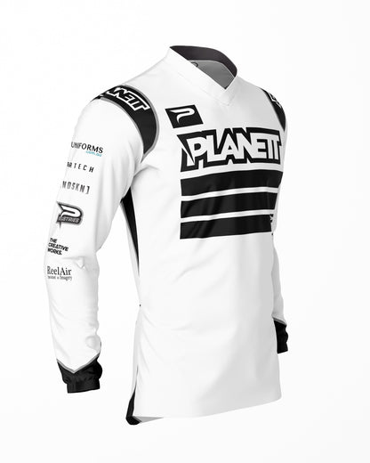 A long-sleeved white and black athletic jersey with brand logos and sponsorship text.