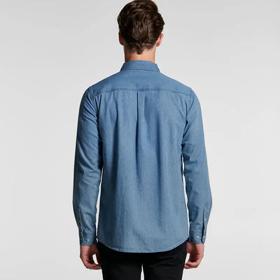 Man in a light blue long-sleeved shirt.