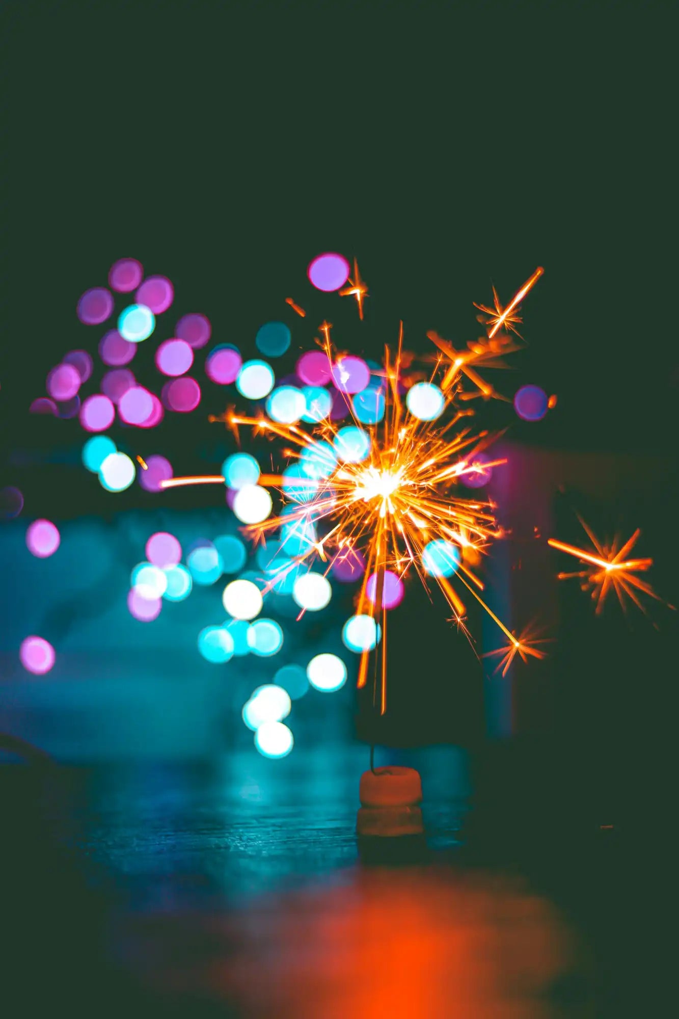 Sparkling firework with colorful bokeh.