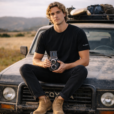 Black vintage twin-lens reflex camera with silver accents