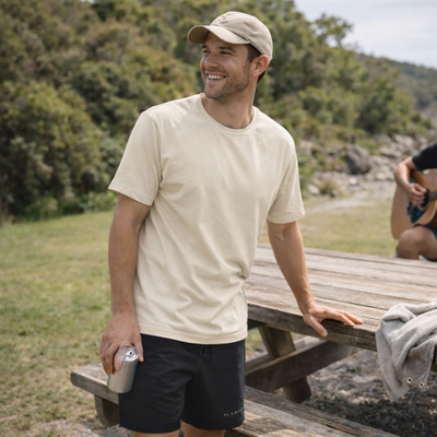 Beige short-sleeved crew neck t-shirt with a soft, casual fit.