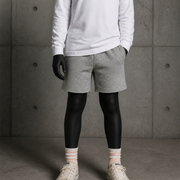 Kids Stadium Shorts 3025 blank product on dark industrial concrete background