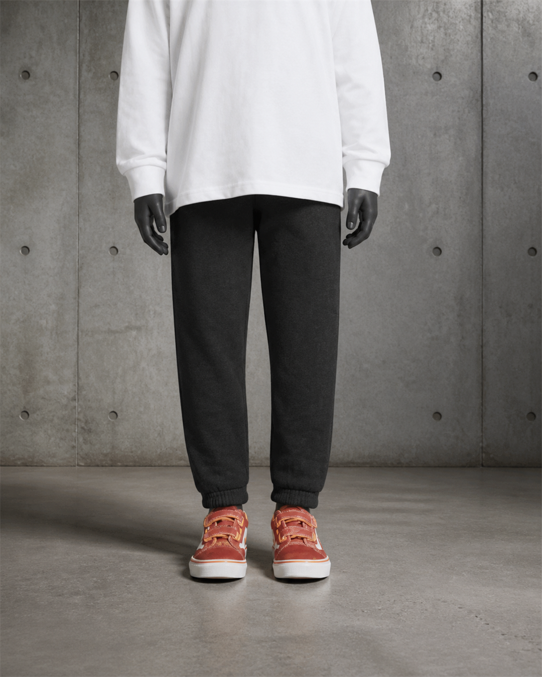 Kids Supply Track Pants 3023 blank product on dark industrial concrete background