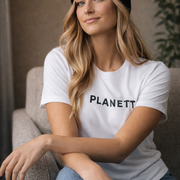 White cotton t-shirt with black ’planett’ text across the chest