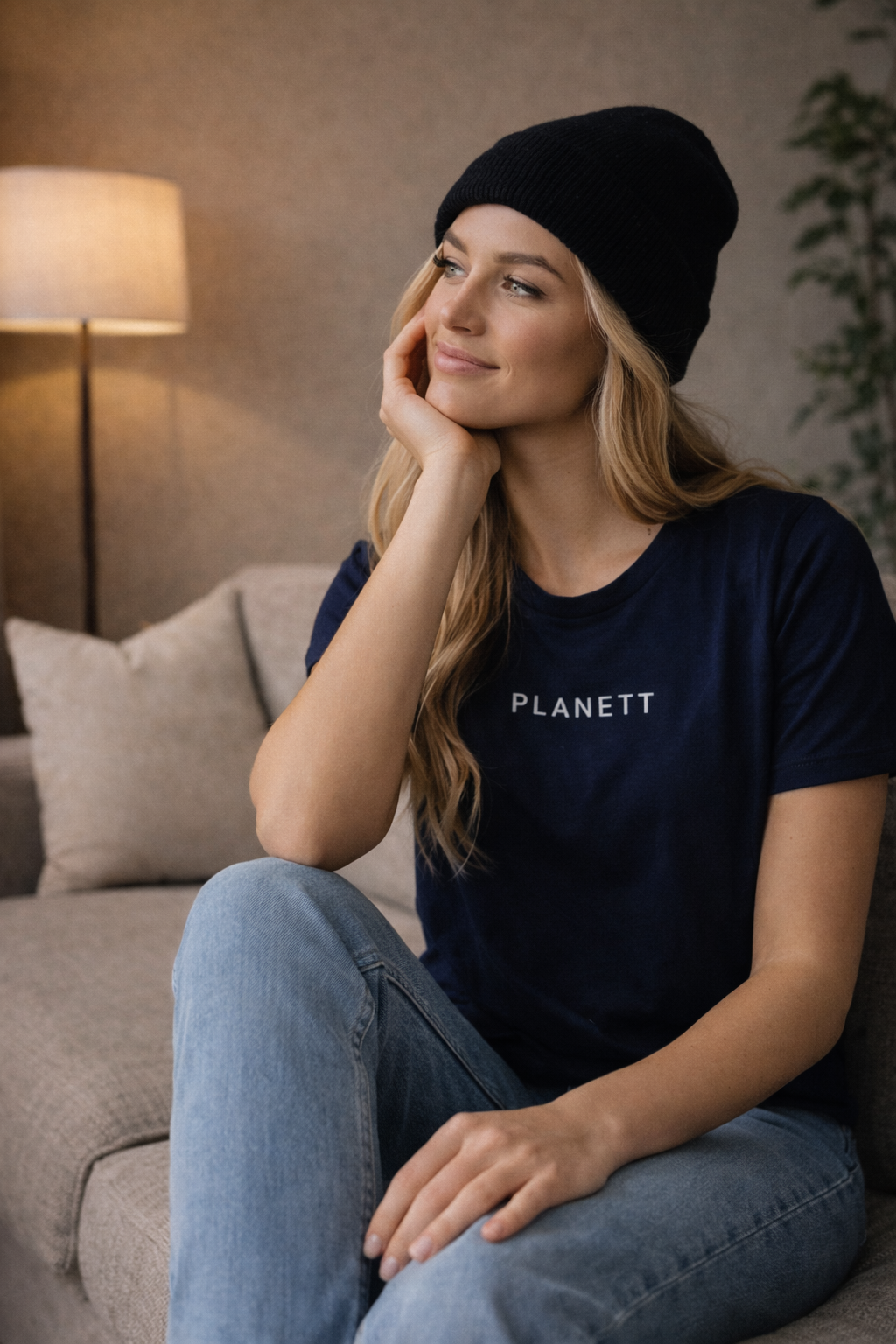 Navy blue cotton t-shirt with white ’planett’ lettering across the chest