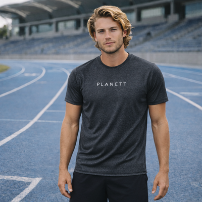 Dark heather gray short-sleeved t-shirt with ’planett’ printed in white across the chest.