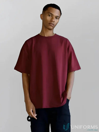 Burgundy oversized t-shirt with short sleeves and a relaxed fit.