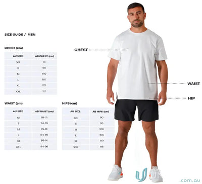 White crew neck t-shirt with black shorts and teal sneakers.