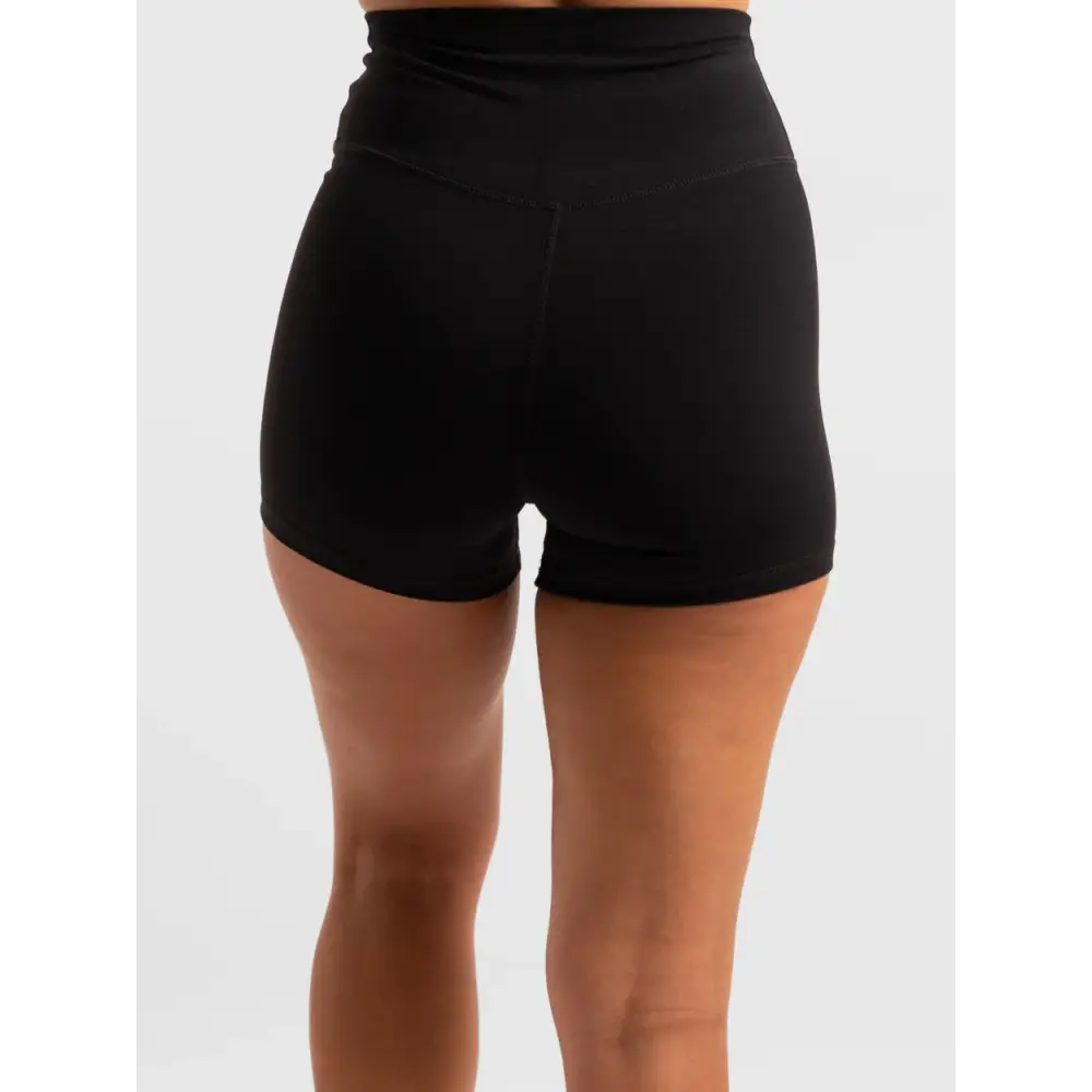 Black high-waisted shorts.