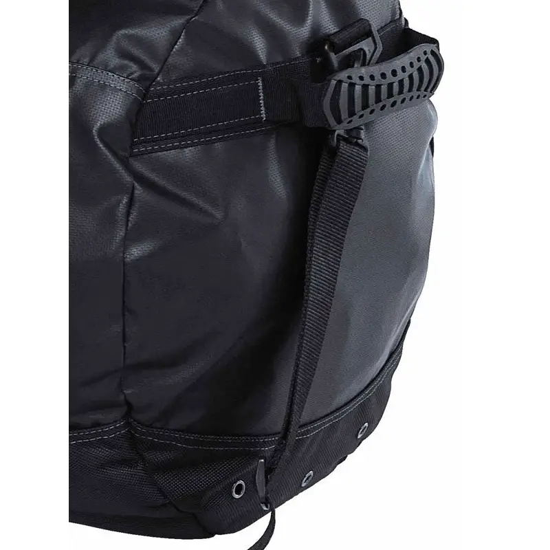 Black duffel bag with handle.