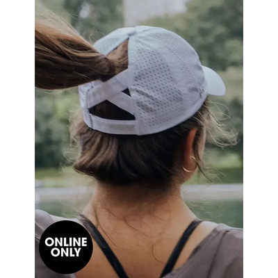 White criss-cross ponytail baseball cap.