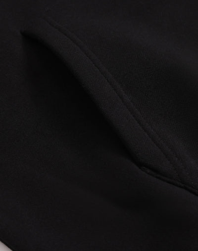 Black fabric with a seam.