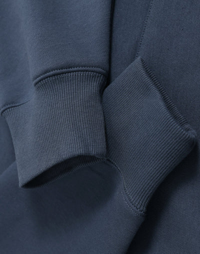 Blue sweatshirt cuffs.