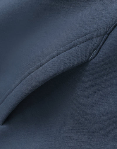 Blue fabric pocket detail.