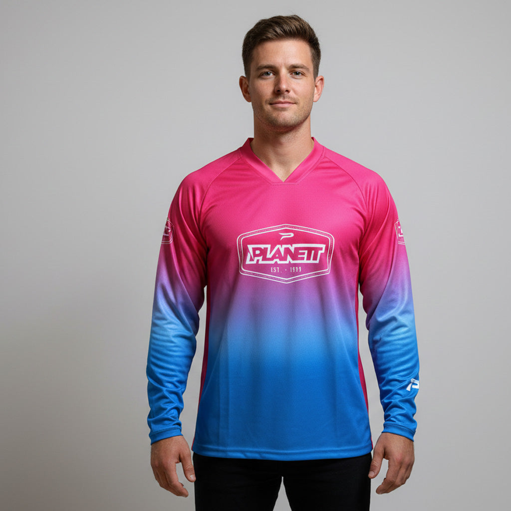 Neon pink and blue gradient long-sleeved jersey with ’planet’ logo.