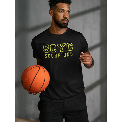 Man holding basketball.