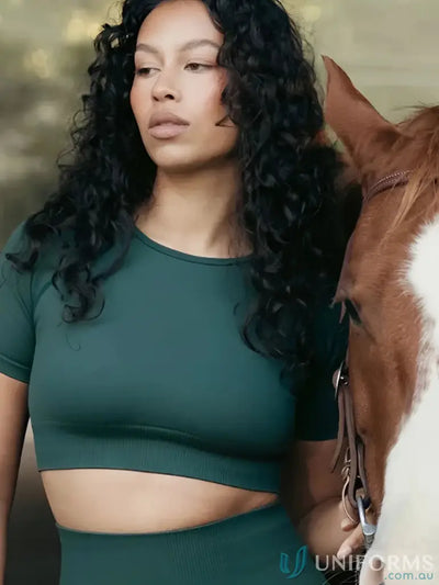 Green short-sleeved crop top with a fitted design and ribbed neckline.
