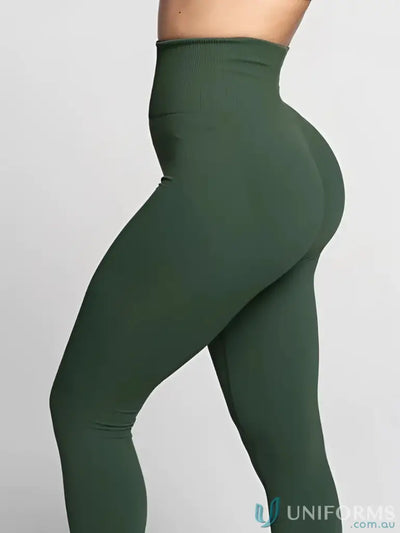 Olive green leggings with high waistband and seamless design.