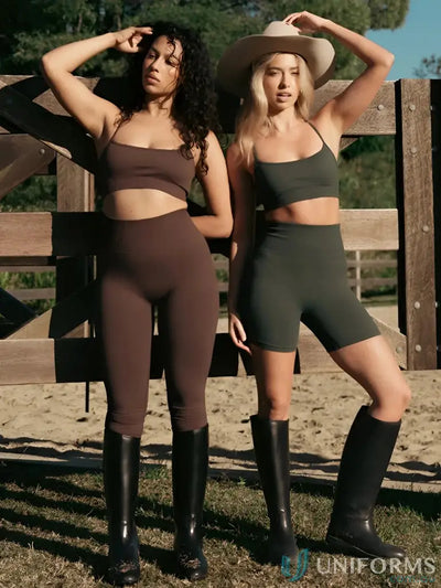 Brown leggings with black crop top and boots, casual wear set.