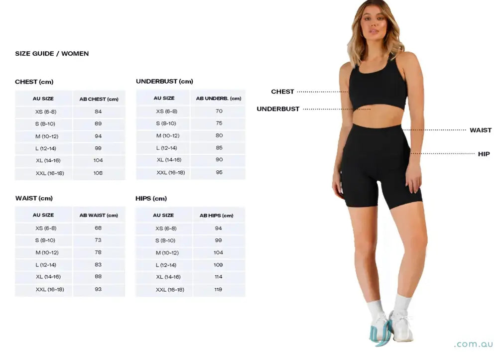 Black high-waisted athletic shorts with white socks and sneakers.