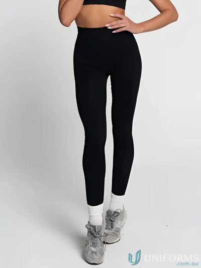 Black leggings with white trim and high waistband, likely made of spandex or a similar stretchy material.