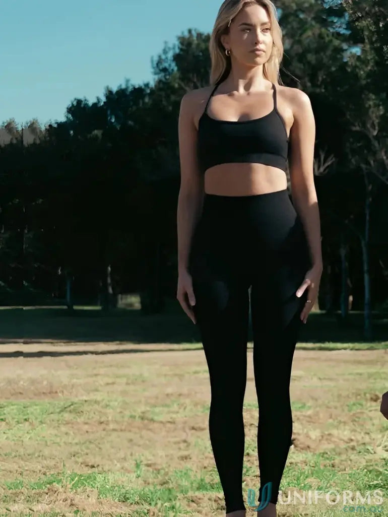 Black leggings with blue stripe, athletic wear.