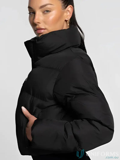 Black puffer jacket with high collar and long sleeves.