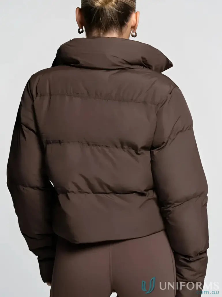 Brown puffer jacket with hood and zipper closure.