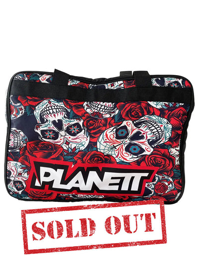 Black duffel bag with a red rose and sugar skull pattern