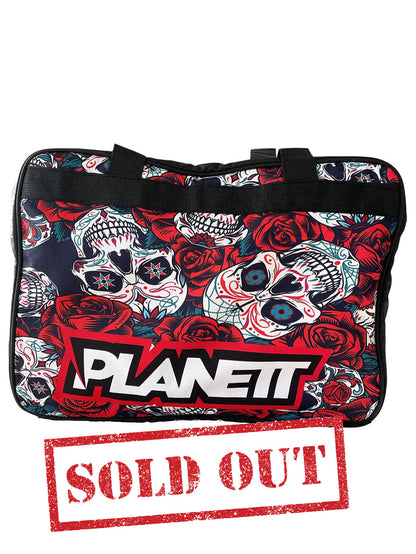 Black duffel bag with a red rose and sugar skull pattern
