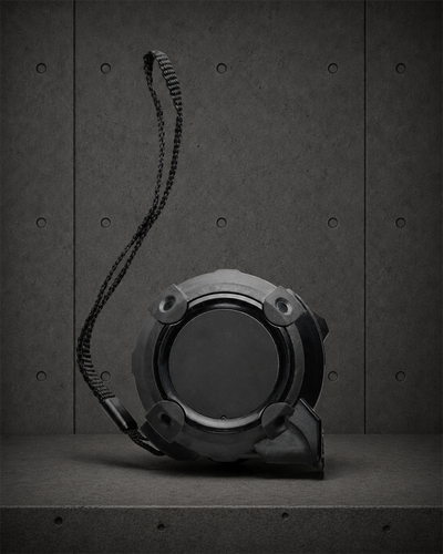 Tape Measure 1510 blank product on dark industrial concrete background